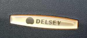A Delsey hardshell suitcase, black. - 3