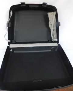 A Delsey hardshell suitcase, black. - 6