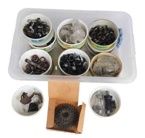 Bicycle spares, including free wheel, wheel hubs, bearings, gear levers, bolts, etc. (1 box)