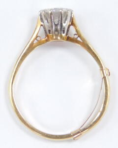 A diamond solitaire ring, high claw set in yellow metal, stamped 18ct, approx 1ct, size Q, 3.6g. - 2