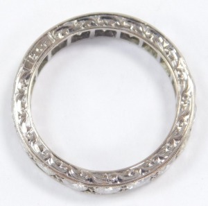 A diamond full eternity ring, set in white metal, stamped 18ct, approx 2.25cts, size P, 5.3g. - 2
