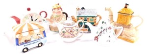 A group of character teapots, comprising a Tony Wood camel teapot., Angler teapot., Arthur Wood Cream Tea teapot., clock face teapot., Refreshments Van teapot., Wade Apres Ski teapot, and a Coronation Street Rovers Return teapot. (AF) (7) N.B. Please not