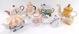 A group of character teapots, comprising a Tony Wood camel teapot., Angler teapot., Arthur Wood Cream Tea teapot., clock face teapot., Refreshments Van teapot., Wade Apres Ski teapot, and a Coronation Street Rovers Return teapot. (AF) (7) N.B. Please not - 2