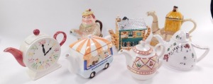 A group of character teapots, comprising a Tony Wood camel teapot., Angler teapot., Arthur Wood Cream Tea teapot., clock face teapot., Refreshments Van teapot., Wade Apres Ski teapot, and a Coronation Street Rovers Return teapot. (AF) (7) N.B. Please not - 4