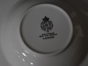 A Royal Worcester porcelain tea and dinner service decorated in the Lagoon pattern, comprising bullet shaped teapot, nine tea cups, seven saucers, ten tea plates, twelve side plates, one oval platter, one oval vegetable dish, nine dinner plates, two circu - 5