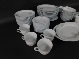 A Winterling Marktleuthen of Bavaria tea and dinner service, comprising twelve dinner, dessert, bowls, saucers, eight cups, two serving bowls, one large circular plate, sauce boat, gravy boat and oval dishes. - 4