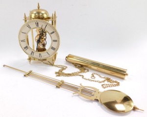 A Sewills of Liverpool brass cased skeleton lantern wall clock, circular dial with chapter ring bearing Roman numerals, single train movement with bell strike, and pendulum, No 701 - 781. - 4