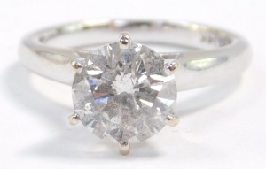 A diamond solitaire ring, high claw set in white metal, stamped 14k, approximately 2cts, size J/k, 4.4g. - 2