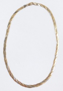 A 9ct three coloured gold necklace, on a lobster claw clasp, 9.3g. - 2