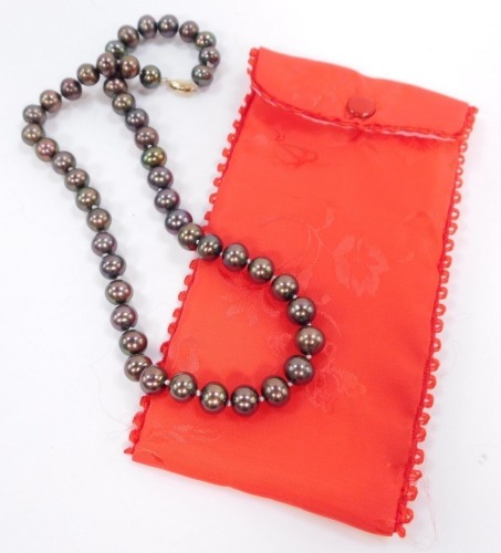 A grey lustre cultured pearl necklace, on a yellow metal hook clasp, stamped 14K, each pearl approx 8 mm.