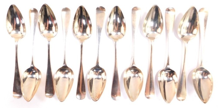 Twelve Dutch silver table spoons, monogram engraved, assay mark for The Hague, 22.10oz.