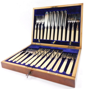 A silver plated fish canteen of cutlery, with silver ferrules and ivory handles, mahogany cased with brass escutcheons, for Fattorini & Sons, Sheffield 1907. - 2