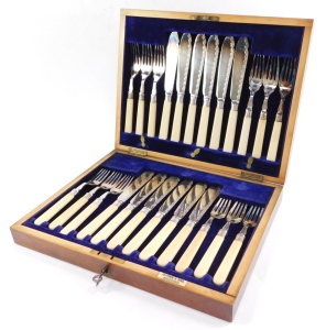 A silver plated fish canteen of cutlery, with silver ferrules and ivory handles, mahogany cased with brass escutcheons, for Fattorini & Sons, Sheffield 1907. - 3