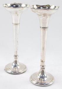 Two George V silver bud vases, having a moulded bowl, above a tapering cylindrical stem with flared base, both with loaded bases, 7cm and 8cm respectively. - 3