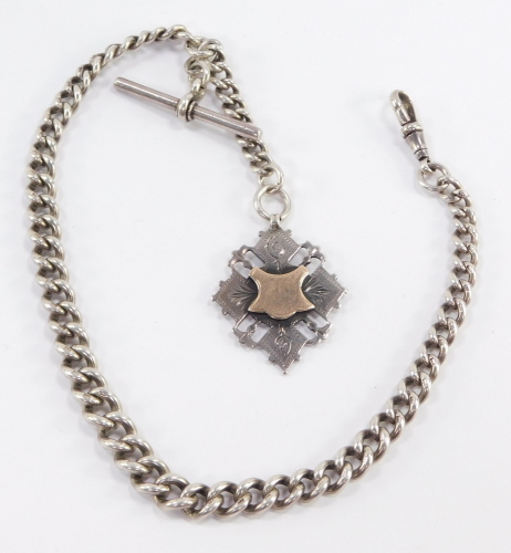 An Edwardian silver graduated curb link watch chain, terminating upon T bar and watch link, with additional fob chain having diamond shaped fob, with vacant cartouche, Herbert Bushell, Birmingham 1902, 1.98oz all in, total length 34cm.