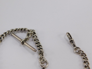 An Edwardian silver graduated curb link watch chain, terminating upon T bar and watch link, with additional fob chain having diamond shaped fob, with vacant cartouche, Herbert Bushell, Birmingham 1902, 1.98oz all in, total length 34cm. - 4
