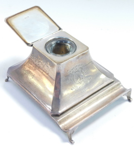 A George V loaded silver ink well and pen tray, with glass liner, of outswept form, engraved Stockport Golf Club 1930, Birmingham 1929, 11.01oz all. 9.5cm wide. - 4
