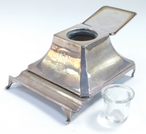A George V loaded silver ink well and pen tray, with glass liner, of outswept form, engraved Stockport Golf Club 1930, Birmingham 1929, 11.01oz all. 9.5cm wide. - 6