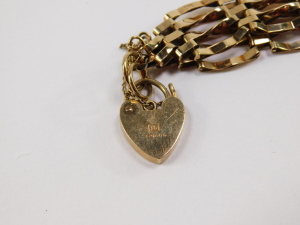 A 9ct gold gate link bracelet, comprising nine gate sections, security chain and padlock clasp, 9.8g, 20cm long. - 4