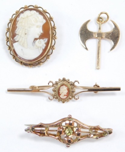 A 9ct gold and shell cameo brooch, bust portrait of a lady, bar brooch, bust portrait of a lady, a Victorian 9ct gold and peridot floral bar brooch, and a Nordic hammer pendant, stamped 585, 10.8g all in.