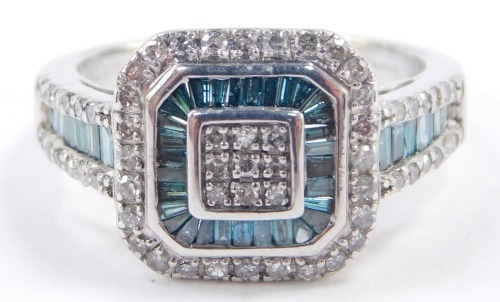 A 10ct white gold and diamond ring, with a central square design, set with brilliant cut diamonds and blue baguette cut diamonds, size P/R, 4.9g.