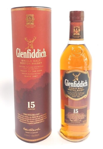 A bottle of Glenfiddich Single Malt Scotch Whisky, 15 years old, boxed.