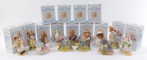 A group of Royal Albert World of Beatrix Pottery figures, including Peter Ate Radish, Tiggywinkle, J Puddleduck, Diggory Diggory Delvet. (13)