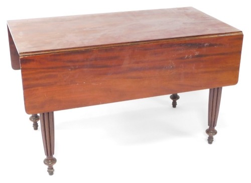 A Victorian mahogany drop leaf dining table, with reeded legs, 121cm wide, 124cm long when extended.