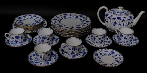 A Spode blue and white porcelain part tea service decorated in the Colonel pattern, comprising teapot, six cup, saucer and plate trios, and six plus one larger sandwich plates.