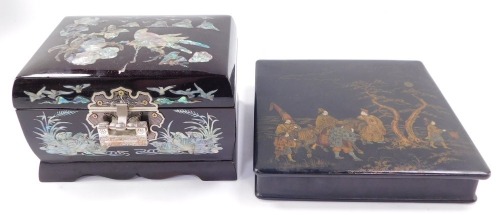 An early 20thC chinoiserie black lacquer box, 19cm square, together with a mother of pearl inlaid musical jewellery box. (2)