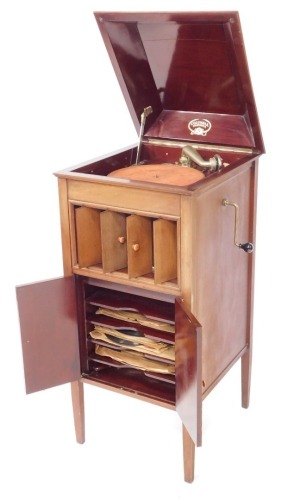 A mahogany cabinet gramophone, labelled Columbia Grafonola, with chrome plated fittings, on square tapering legs, 100cm high, 46cm wide.