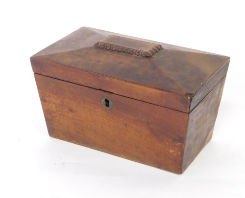 A Regency mahogany sarcophagus shaped tea caddy, the hinged lid enclosed two lidded divisions, 27cm wide.