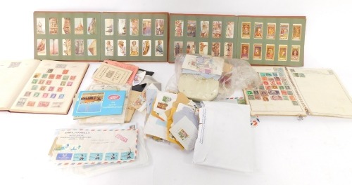 A collection of cigarette cards, to include Wills's Flowers, etc., loose stamps, and other items. (a quantity)