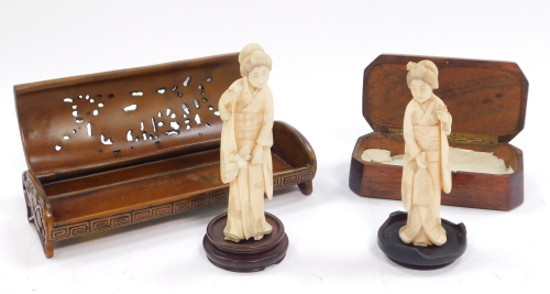 Oriental items, comprising a pair of Japanese carved ivory Okimono, a bronze metal box with pierced lid cast with figures on horse back, etc., and a box with lid inlaid with bone. (4)