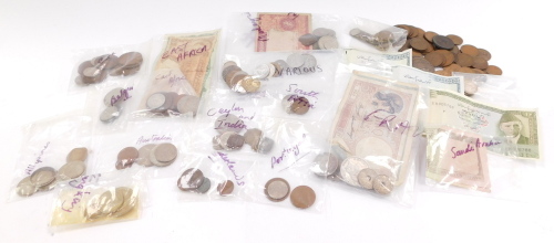 Coins and bank notes, predominantly foreign, to include East African Currency Board, Indian notes, France, other Eastern countries etc. (a quantity)