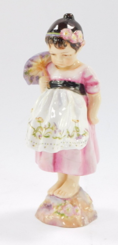 A Royal Worcester porcelain figure of Spain, modelled by Frieda Doughty, printed marks in puce to underside, 13cm high.
