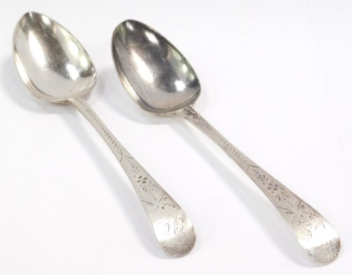 A pair of George III silver tablespoons, with bright cut engraving, shield reserve, monogram engraved, Samuel Godbehere & Edward Wigan, London 1799, 3.52oz.