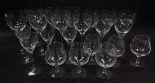 A part suite of Kosta Boda Swedish table glass ware in the Chateau pattern, comprising six red and six white wine glasses, four dessert wine glasses, and six brandy balloons.