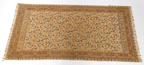 An Iranian throw, printed and painted with floral and foliate motifs, bears stamp verso, 100cm x 200cm.
