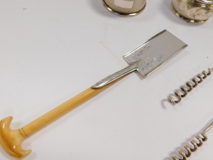 A pair of silver napkin rings, with engine turned decoration, Birmingham 1957, further napkin ring, monogram engraved, Birmingham 1901 (AF), three coffee spoons with coiled handles, salt spoon, Sheffield 1933, 2.54oz, and a Victorian silver plated trowel - 4