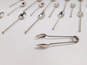 A set of twelve Dutch early 20thC silver coffee spoons, with spiral twist handles, together with a pair of sugar tongs, and four tea spoons, 5.27oz. - 3