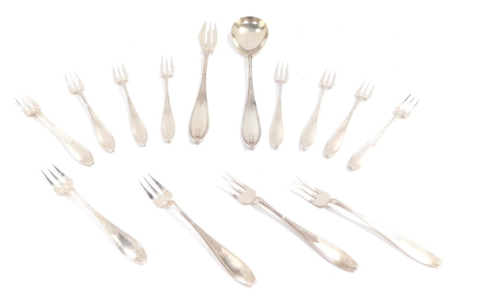 A pair of silver napkin rings, with engine turned decoration, Birmingham 1957, further napkin ring, monogram engraved, Birmingham 1901 (AF), three coffee spoons with coiled handles, salt spoon, Sheffield 1933, 2.54oz, and a Victorian silver plated trowel 