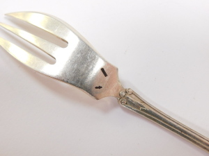 A pair of silver napkin rings, with engine turned decoration, Birmingham 1957, further napkin ring, monogram engraved, Birmingham 1901 (AF), three coffee spoons with coiled handles, salt spoon, Sheffield 1933, 2.54oz, and a Victorian silver plated trowel - 3