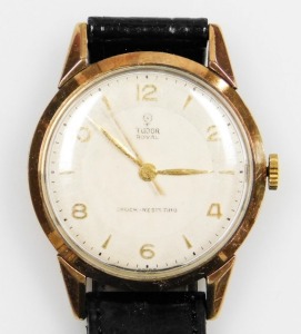 A Tudor Royal gentleman's wristwatch, with silvered coloured dial and gold hands, in a yellow metal case, marked 9ct, on a later leather strap, in Omega watch box, the dial 2.5cm wide, 30.1g all in.
