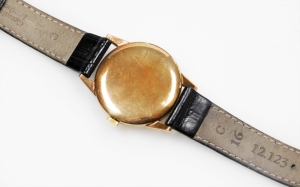 A Tudor Royal gentleman's wristwatch, with silvered coloured dial and gold hands, in a yellow metal case, marked 9ct, on a later leather strap, in Omega watch box, the dial 2.5cm wide, 30.1g all in. - 2