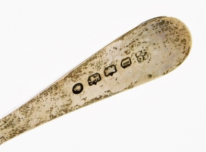 A Victorian silver caddy spoon, with a shell pattern bowl and beaded handle, Exeter 1876, 9cm long. - 2