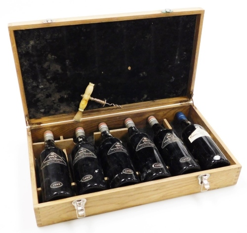 Five bottles of Dow's Vintage 1999 port, a further bottle of port, label damaged, and a Senhora Da Ribeira plated corkscrew with simulated bone handle, contained in a hardwood Dow's Quinter Senhora Da Ribeira Vintage port case, the case 55cm wide. (6)