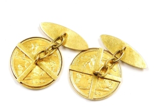 A pair of Victorian half gold sovereign cufflinks, dated 1896, in yellow metal frames, unmarked, 12.7g all in. - 2