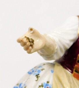 A Meissen porcelain figure group, of a young girl feeding cockerel, chicken and chicks, on a gilt highlighted circular base, blue cross swords mark to underside and impress number 115, 11cm high. (AF) - 4