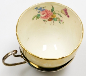 A set of four early 20thC Grosvenor China teacups and saucers, each teacup with a silver engine turned holder with marks for Birmingham 1921, in a fitted case. - 6